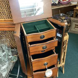 Jewelry armoire with “secret” side pockets