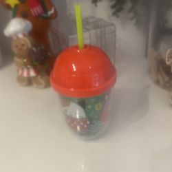 Brand new squish, mellow Christmas cup with straw would make a great gift or stocking stuffer never been used tag still on it