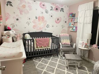 Gray wooden crib — mattress not included