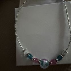 Clear Necklace With Blue And Pink Beads