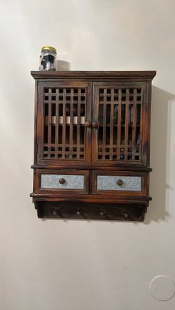 Vintage wooden spice storage cabinet