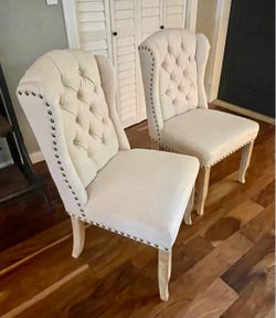 Pair of Tufted Wingback Dining Chairs with Nailhead Trim