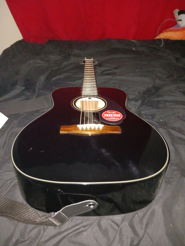 Black Fender Acoustic guitar