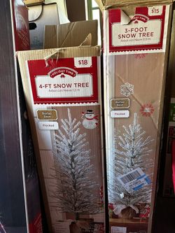4ft and 3ft Flocked Snow Trees With Burlap Bases. $25 For Both.