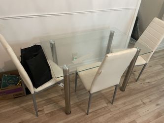 Glass dining table with 4 chairs