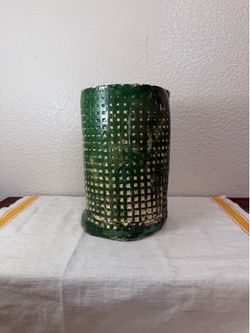 Flower vase textured green ceramic planter or vase features a distinctive deep green handmade