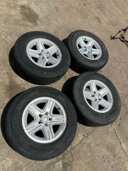 Jeep Cherokee XJ OEM Wheels and Tires 5x4.5 lug Pattern