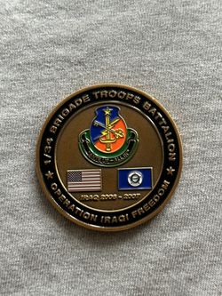 Operations iraqi  freedom coin prsntd by sergeant major for excellence