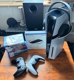 PS5 Pro 2TB + Stand+ 9 Games + 2 Controller +(Free Gift)