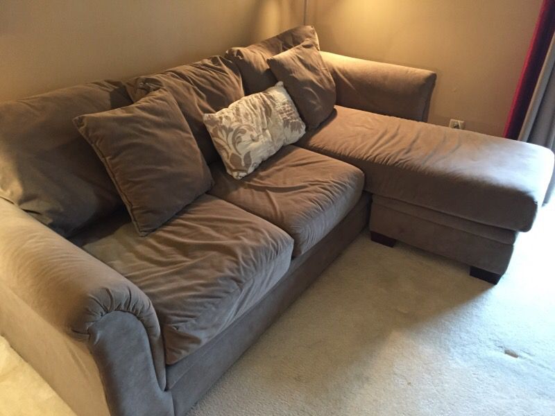 Large brown sectional sofa and chair
