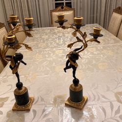 Statues With Candle . 