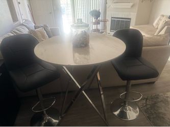 Bar table set with two barstools