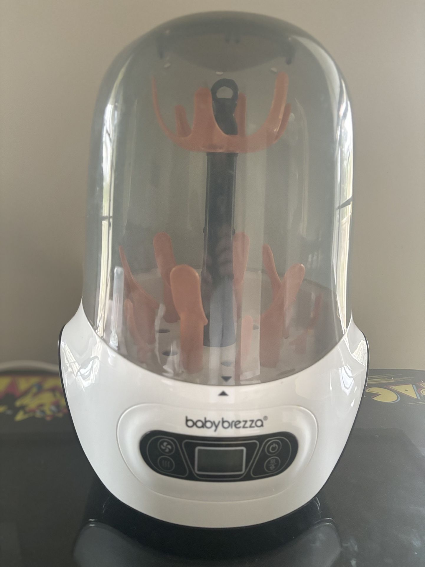 Bottle Sterilizer & Dryer : Baby Brezza, like new! Baby Bottle Sterilizer and Dryer. Fits all bottle types/brands. Free extra drying rack included.