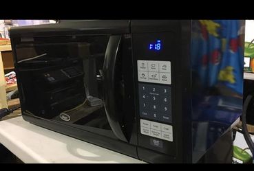 Oster 1.3 Cu. Ft. 1100 Watt Microwave Oven - Black OGZF1301 for Sale in  Portland, OR - OfferUp