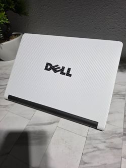 White carbon fiber Dell Chromebook The device is black with a standard QWERTY keyboard and integrated touchpad. Great battery life
NEW CHARGER INCLUDE