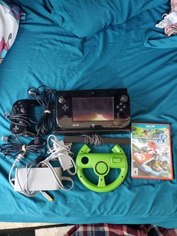 Wii u console + pad + accessories