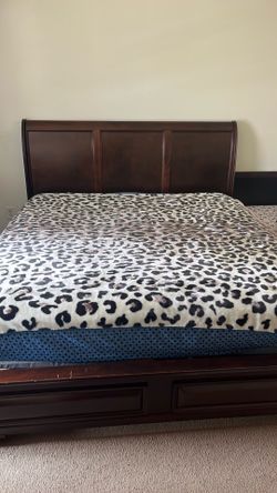 King  size bed ( Mattress is free if you want it ) .