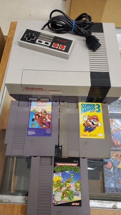 Nintendo one controller and 3 games
