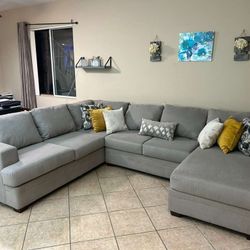 Light Grey Sectional Couch From Living Spaces With Reversible Chaise 