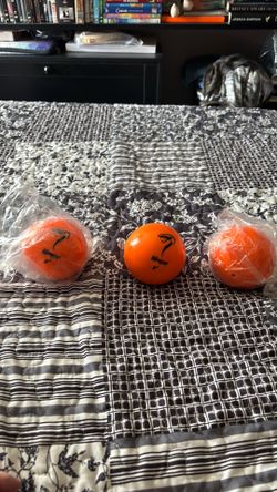 Weighted sand softballs