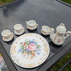 Vintage porcelain doll tea set