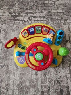 NWOB VTech Turn & Learn Driver Steering Wheel, Lights & Sounds, 9-36M