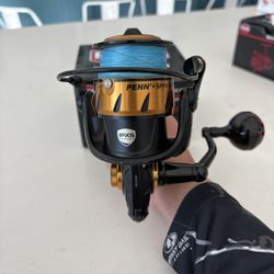 Penn Spinfisher VI 4500 With Red Gomexus Handle 