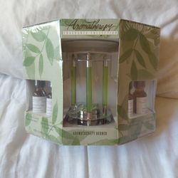 Aromatherapy "Fragrance Collection" aromatherapy burner set 4 Whit essential oils.