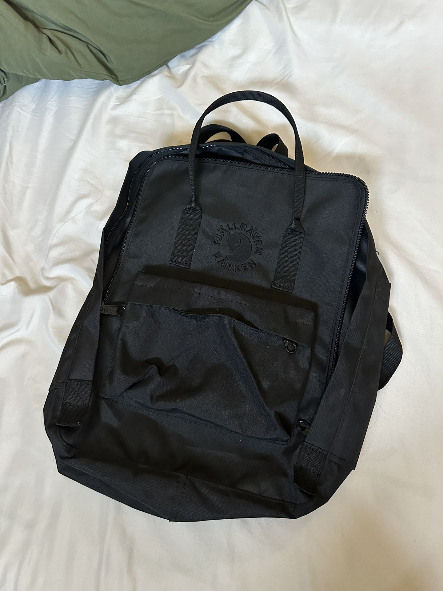 Black Fjallraven Kanken Backpack