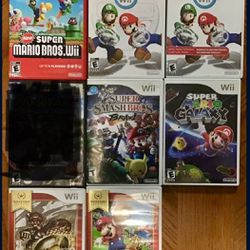 7 Super Mario Bros WII Games $150 For All- Firm!
