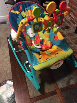 Bouncing/vibrating/rocking seat w/ buckles and toys