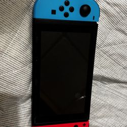 Nintendo switch-comes with charger and deck and controller