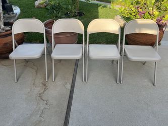 4 Beige Metal Finding Chairs