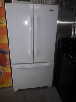 refrigerator brand Whirlpool measures 36 wide and 70 high 3 months warranty delivery and installation