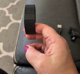 Fitbit Digital Wristwatch with a Buckle Band