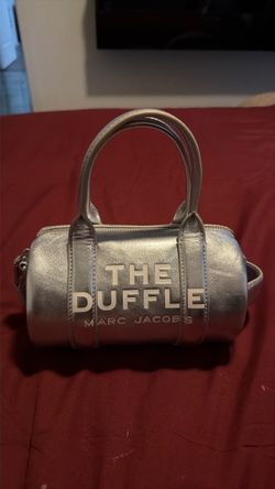 Silver Marc Jacob’s barrel purse
