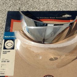 Chrome Motorcycle headlamp visor.