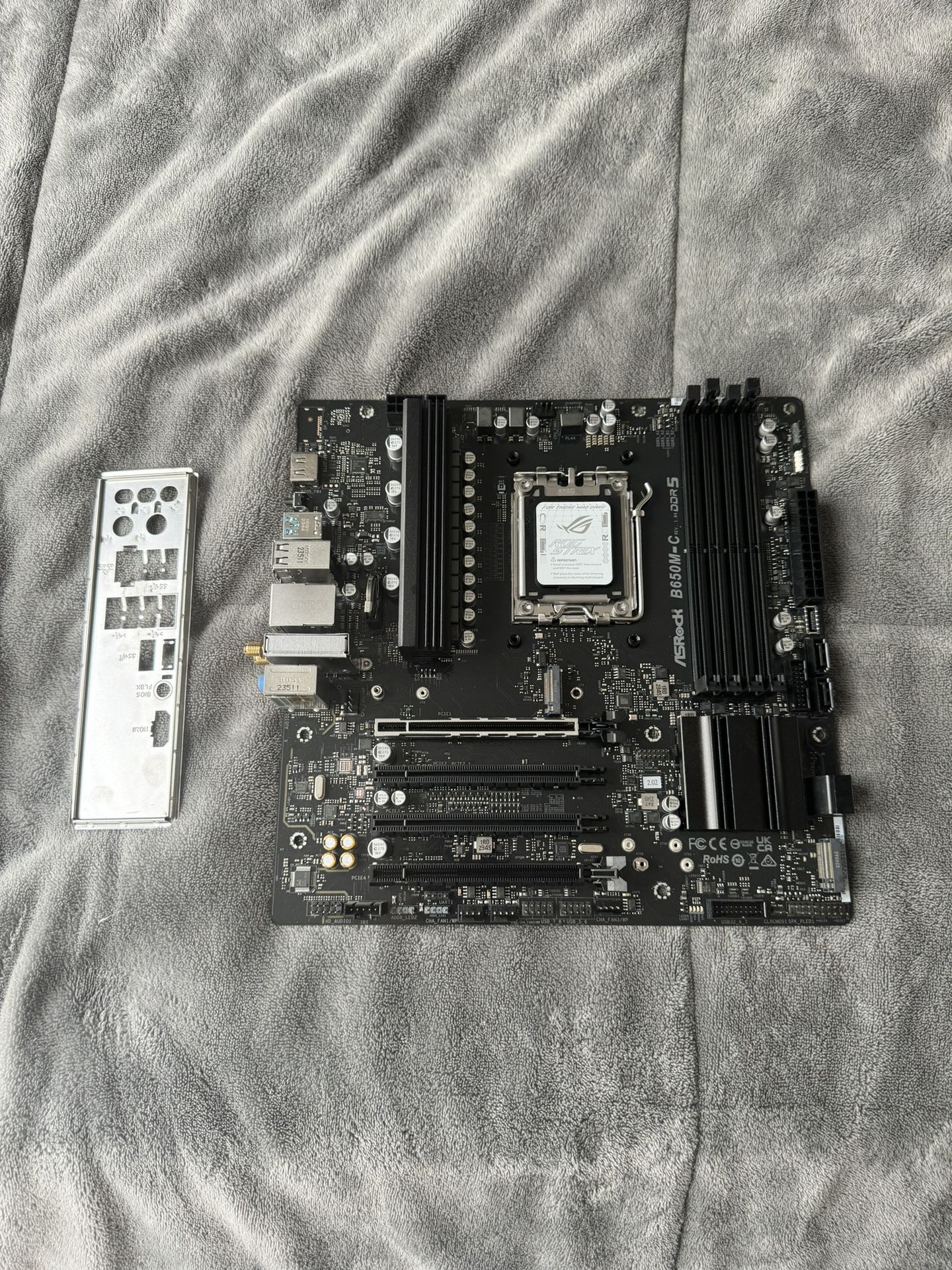 ASRock B650M-C AMD AM5 DDR5 Micro ATX Motherboard, W/Shield