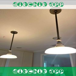 Exclusive Pendant Light - One-of-a-Kind Design Element indicate walk