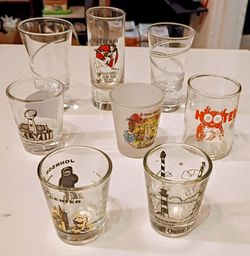 Lot of 8 Collectible Shot Glasses