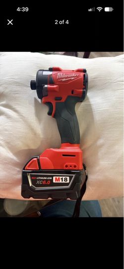 Milwaukee M18 Impact Driver with XC6.0 Battery and charger