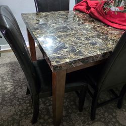 Dining room/ kitchen table with chairs