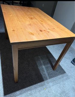 Wooden table with 4 chairs