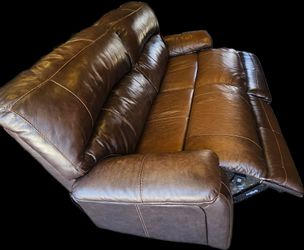Brown leather loveseat recliner