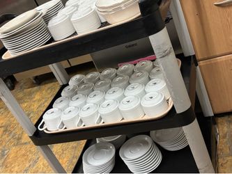 Tea cups and saucers, a few bowls
