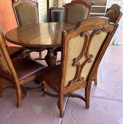 Dinning Table with 6 leather seat chairs