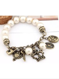 Faux pearl charm bracelet