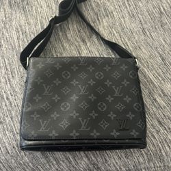 Louis Vuitton Bag.   Negotiable.