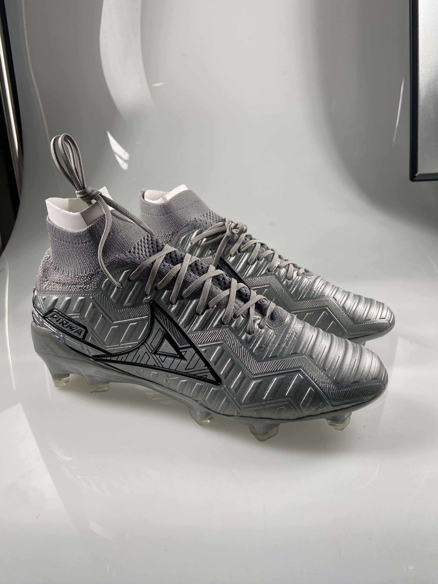 Zapatos pirma de botita color plata