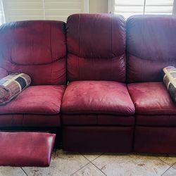 Burgundy, leather reclining sofa